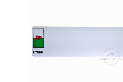 White  Nikkalite Reflective With a travel Flag CYMRU